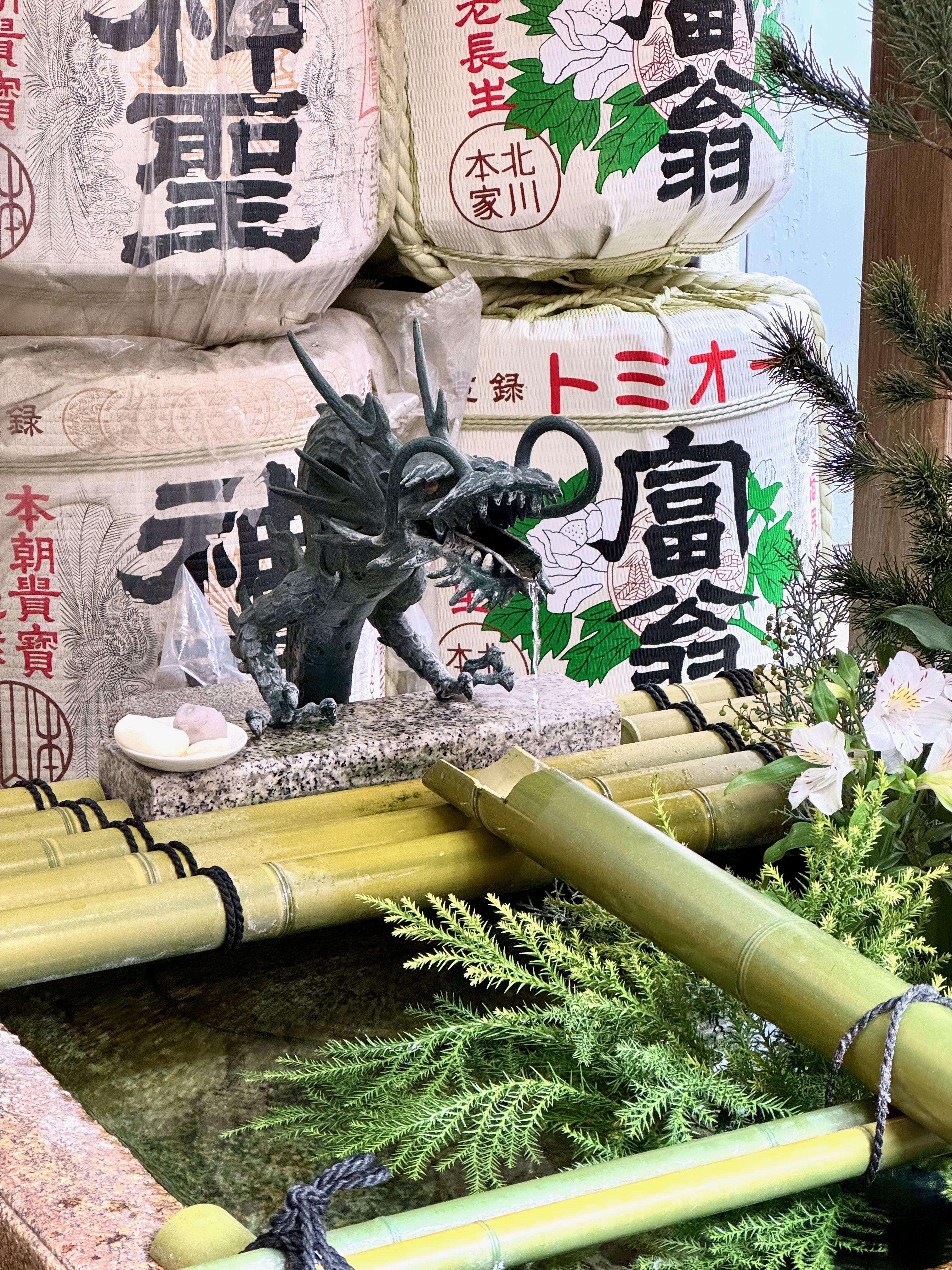 A dragon water fountain in a temple at Kyoto